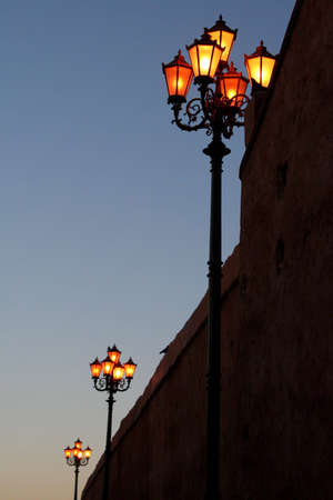 Part of city big wall in Marrakech, Morocco. Sunsetの写真素材