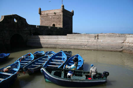  View at the fishing boats from port in Essaouiraの写真素材