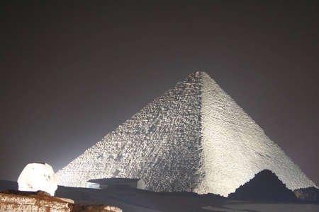 pyramids of giza at night の写真素材
