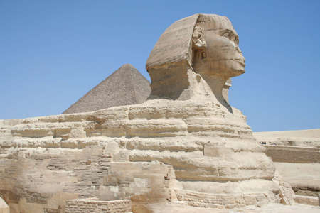The Sphynx in front of pyramid in gaza (Gizeh)の写真素材