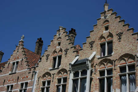 typical scenery at a canal of Brugge, Belgium の写真素材