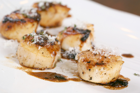 Close up Scallop seafood appetizer with spicesの写真素材