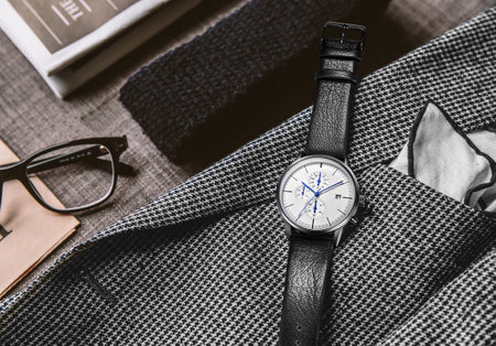 Men's watch on the background of a stylish men's shirt.の写真素材