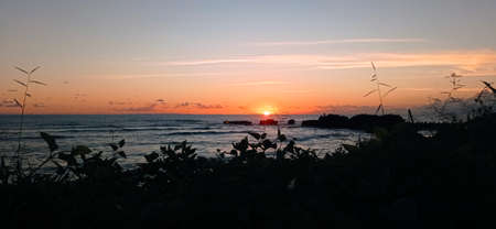 beautiful sunset at Tanah Lot Baliの写真素材