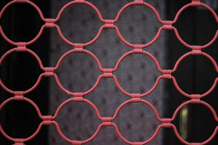 Red fence cageの写真素材