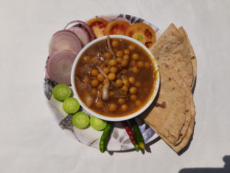 Chole masala curry with roti and salad. A traditional north Indian lunch, dinner, breakfast....