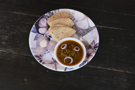 Chana Masala with Roti. Spicy Chickpeas is traditional North Indian main course recipe. It can be...