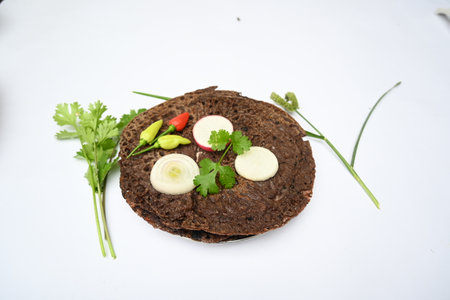 Eleusine coracana or finger millet chapati. Its other names Ragi and madua in India and Kodo in...
