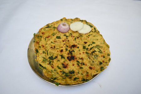 Methi paratha or fenugreek flatbread. It is made from wheat flour and fenugreek leaves. Healthy...
