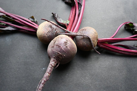 Beetroot on black background. Its other names Â beets,Â table beet,Â garden beet,Â red beet,Â dinner beet and Â golden beet. Its eaten boiled, roasted, raw, salad and vegetable.の写真素材