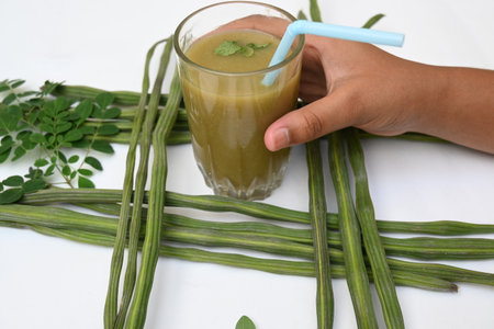 Moringa oleifera or drumstick pods soup. Moringa oleifera other names moringa, horseradish, andÂ ben oilÂ tree andÂ benzolive. Healthy and tasty soup. Healthy drinks.の写真素材
