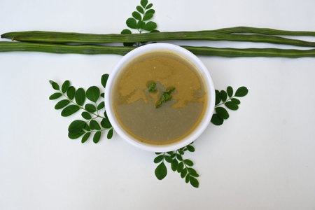 Moringa oleifera or drumstick pods soup. Moringa oleifera other names moringa, horseradish, andÂ ben oilÂ tree andÂ benzolive. Healthy and tasty soup. Healthy drinks.の写真素材