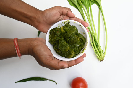 Indian Spinach and Potato Curry. Indian vegetable curry with spinach and potato. A dry dish made...