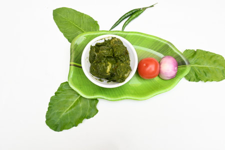 Indian Spinach and Potato Curry. Indian vegetable curry with spinach and potato. A dry dish made from fried potatoes and spinach in Indian style.の写真素材