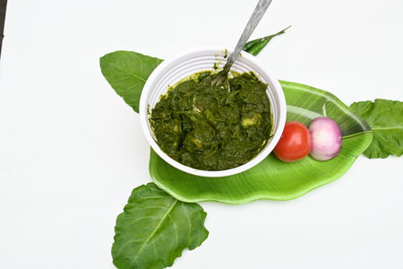 Indian Spinach and Potato Curry. Indian vegetable curry with spinach and potato. A dry dish made...