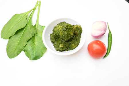 Indian Spinach and Potato Curry. Indian vegetable curry with spinach and potato. A dry dish made...