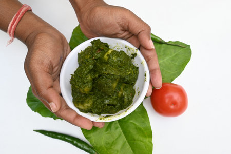 Indian Spinach and Potato Curry. Indian vegetable curry with spinach and potato. A dry dish made...