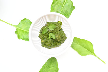 Indian Spinach and Potato Curry. Indian vegetable curry with spinach and potato. A dry dish made...