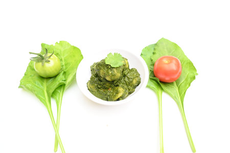 Indian Spinach and Potato Curry. Indian vegetable curry with spinach and potato. A dry dish made...
