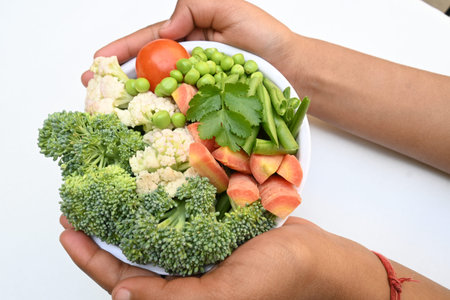 Vibrant medley of fresh vegetables. Features broccoli, cauliflower, tomatoes, Carrot, green beans,...