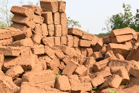 Raw clay bricks have soaked in water.
Sun dried mud bricks, ruined by getting soaked in rain water....