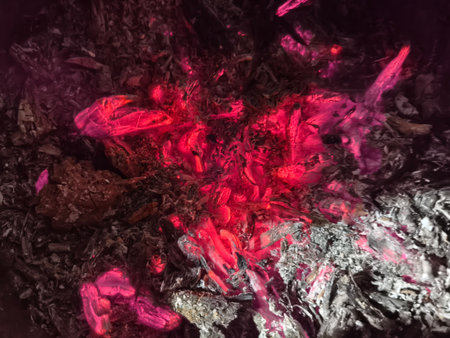 Smoldering charcoal in an earthenware pot. This fire is what remains after the wood flames have died down. In rural areas, it is used for heating during the winter.の写真素材