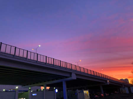 Sunset in the city of Orenburg, Russia. View from the bridgeの写真素材