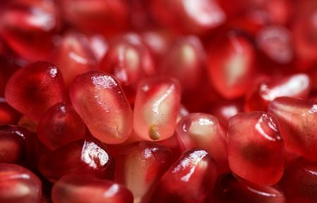 Pomegranate background. Macro of peeled ripe seedsの写真素材