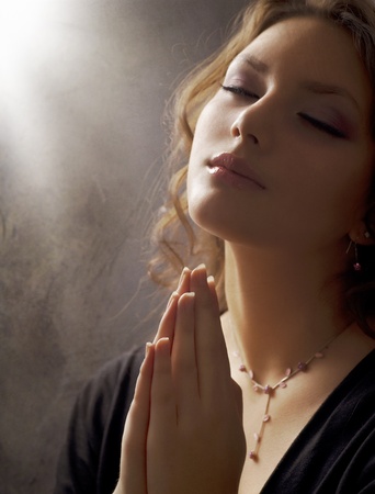 Praying Beautiful Womanの写真素材