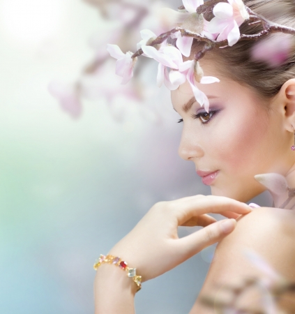 Beautiful Spring Girl with flowersの写真素材