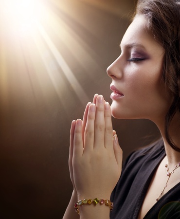 Praying Woman.Retro Styled.Soft focusの写真素材