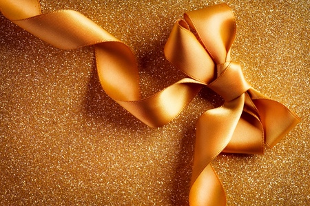 Greeting Card. Gold Bow on a Blinking Background の写真素材