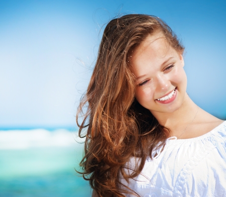 Beautiful Girl in Tropical Resort  Travel and Vacation concept の写真素材