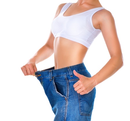 Weight Loss Woman isolated on a white background  Slim Bodyの写真素材