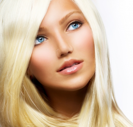 Beautiful Blond Girl isolated on a White Background の写真素材