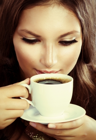 Beautiful Girl Drinking Coffee or Tea の写真素材