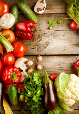 Healthy Organic Vegetables on a Wooden Background の写真素材