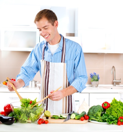 Young Man Cooking  Healthy food  Vegetable Salad の写真素材