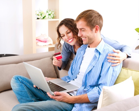 Online Shopping  Couple Using Credit Card to Internet Shop の写真素材