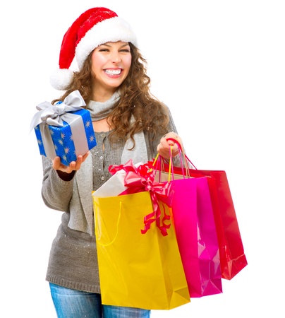 Christmas Shopping  Girl With Bags isolated on Whiteの写真素材