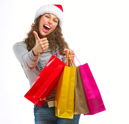 Christmas Shopping  Girl With Bags isolated on Whiteの写真素材