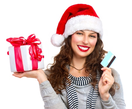 Christmas  Happy Smiling Woman with Gift Box and Credit Card の写真素材