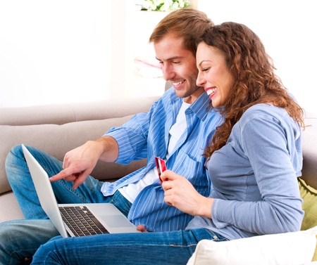 Online Shopping  Couple Using Credit Card to Internet Shop の写真素材