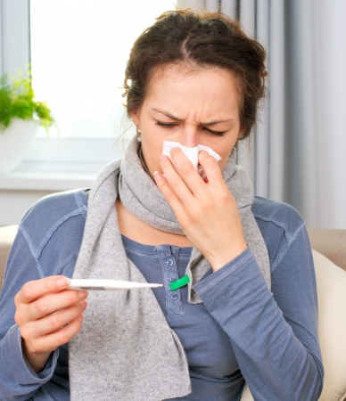 Sick Woman with Thermometer  Flu  Woman Caught Cold の写真素材