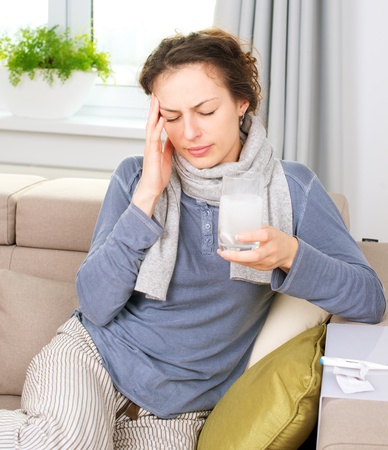Ill Woman Taking Aspirin Pills Headacheの写真素材