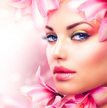 Beautiful Girl With Orchid Flowers  Beauty Woman Face