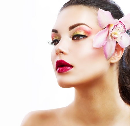 Beauty Portrait  Beautiful Stylish Girl with Orchid Flower の写真素材