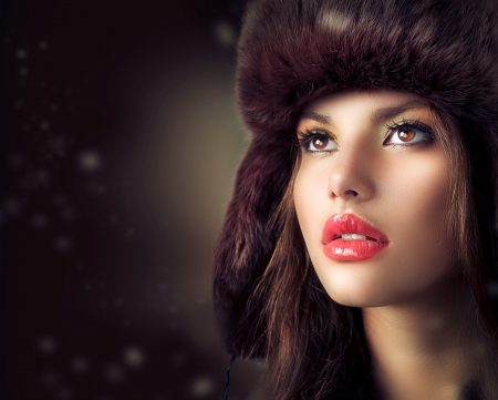 Beautiful Young Woman in a Fur Hat  Winter Style の写真素材
