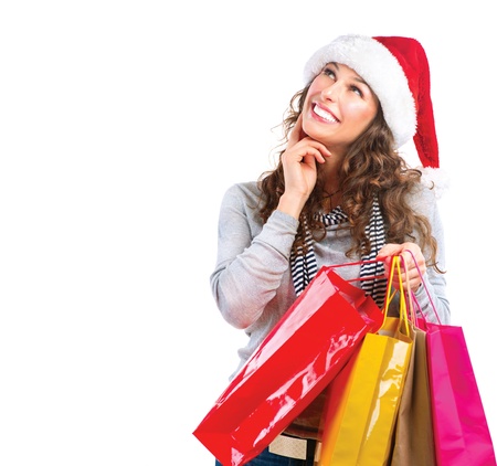 Christmas Shopping  Woman with Bags over White  Sales の写真素材