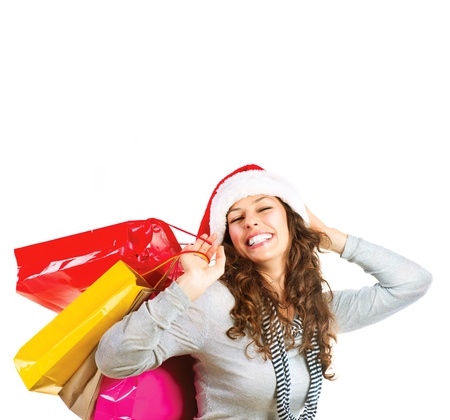 Christmas Shopping  Woman with Bags over White  Sales の写真素材